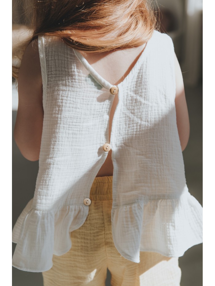 Muślinowa bluzka z falbanką 