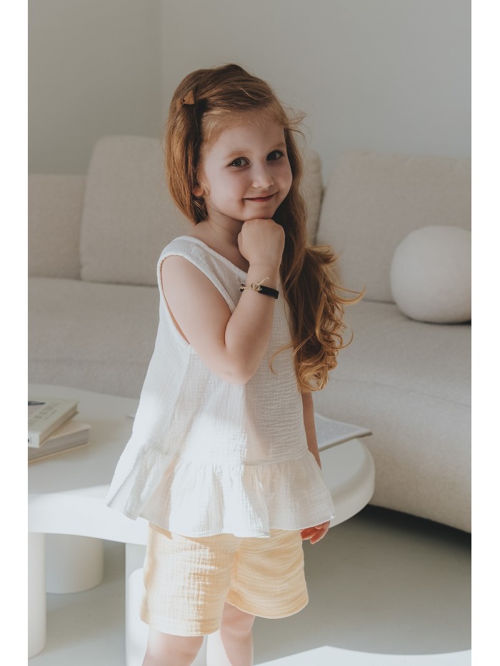 Muślinowa bluzka z falbanką 